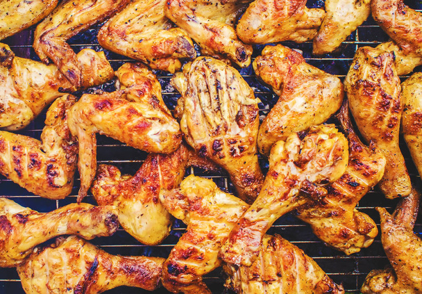 wings and grilled vegetables. selective focus. - Photo, Image