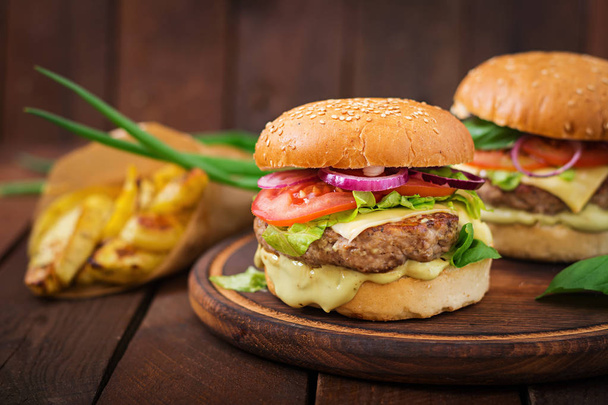 beef burgers on wooden plate - Photo, Image