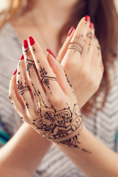 Female hands with Mehndi  - 写真・画像