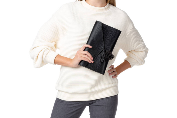 Woman holding a handbag isolated on white background - Fotoğraf, Görsel