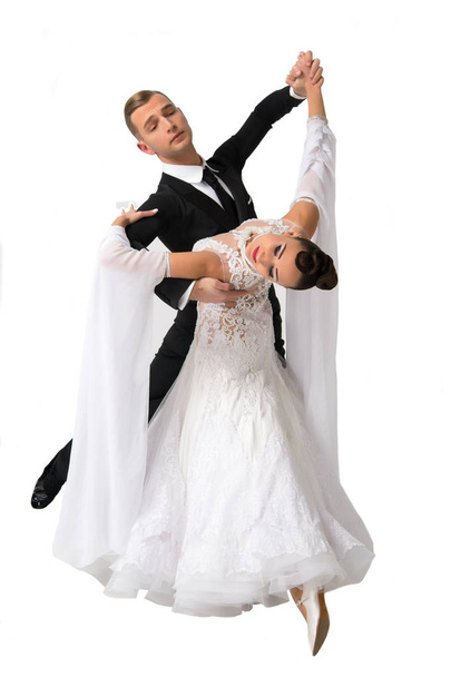 ballrom dance couple in a dance pose isolated on white bachground - Fotó, kép