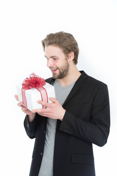 handsome bearded man with present, gift box in red ribbon - Φωτογραφία, εικόνα