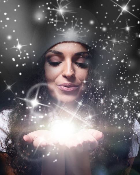 beautiful christmas woman holding magic stars - Photo, Image