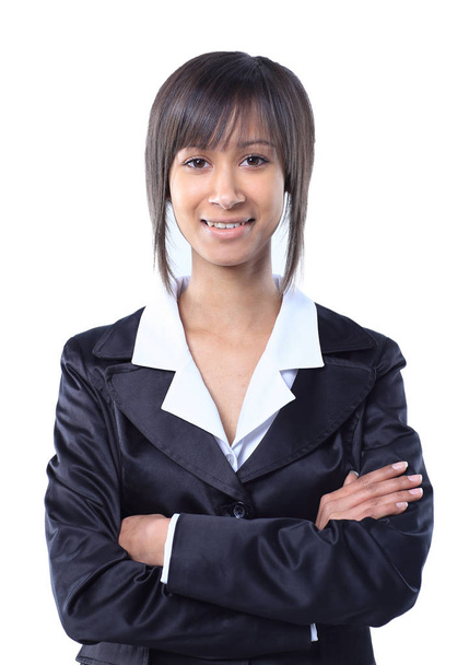 Happy businesswoman wearing black suit standing and folding arms - Foto, afbeelding
