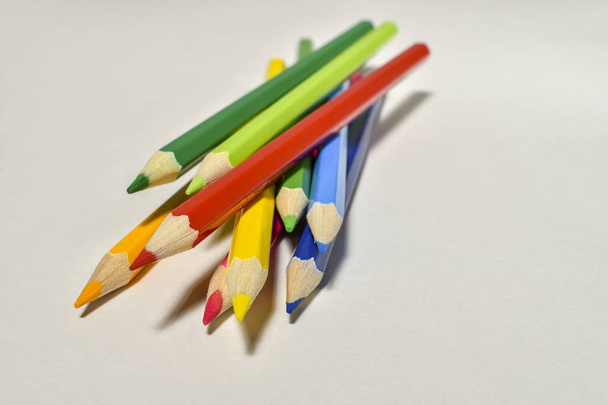 colored pencils on white background - Fotó, kép