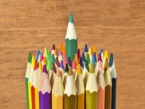 colored pencils on wood background - Fotó, kép