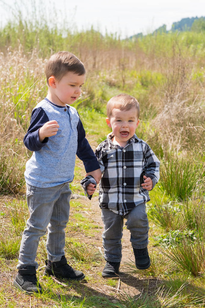 Brothers Playing Outdoors - Photo, image
