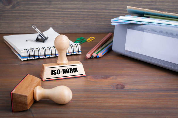 Iso-Norm. Rubber Stamp on desk in the Office - Photo, Image