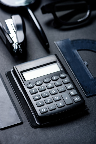 calculator with various office utensils - Photo, Image