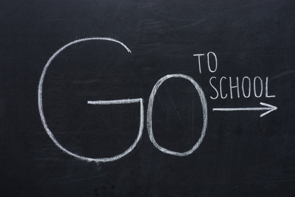 phrase go to school with arrow sign - Photo, Image
