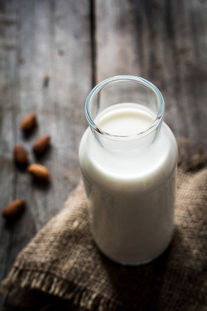Almond milk in bottle - Foto, immagini