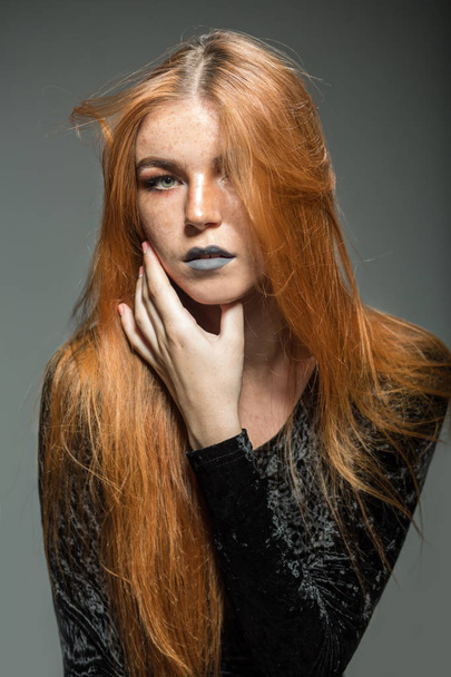 Beautiful woman with long red hair - Fotoğraf, Görsel