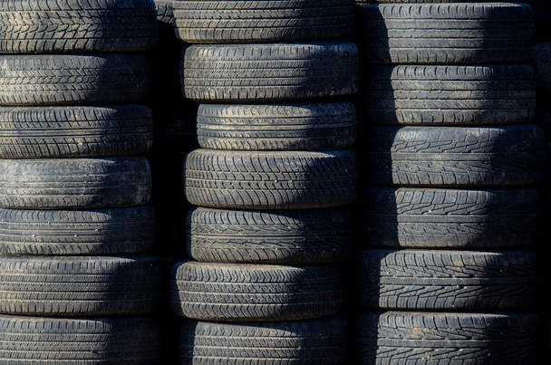 used auto tires stacked in piles - Photo, Image