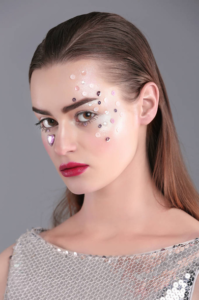 young woman with creative make up - Foto, afbeelding
