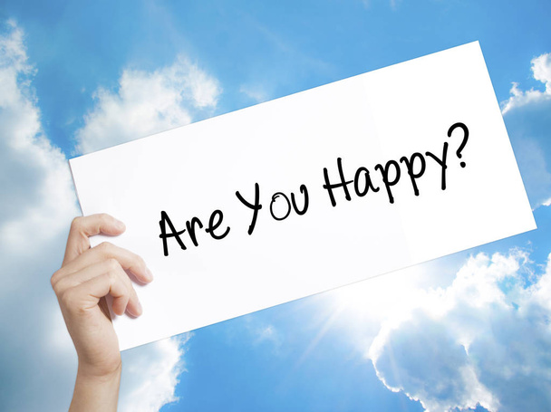 Are You Happy? Sign on white paper. Man Hand Holding Paper with  - Фото, зображення