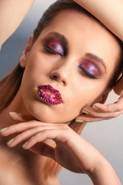 young woman with creative makeup - Fotografie, Obrázek