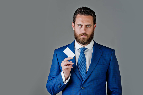 office man with paper credit card, business ethics and fashion - Фото, зображення