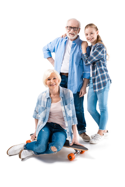 family posing with skateboard  - Photo, Image