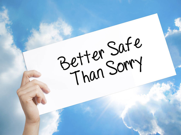 Better Safe Than Sorry Sign on white paper. Man Hand Holding Pap - Photo, Image