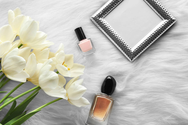 Beautiful composition of cosmetics with tulips   - Foto, imagen