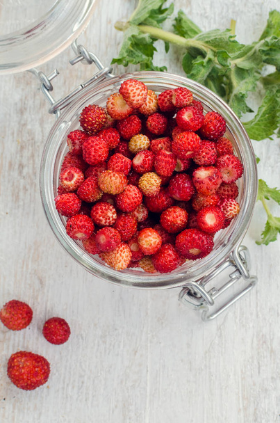 Wild strawberry in glass jar - Photo, Image
