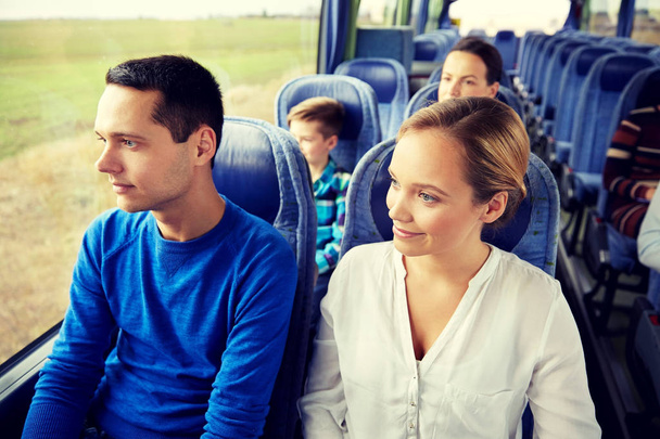 happy couple or passengers in travel bus - Foto, afbeelding