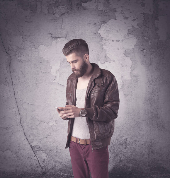Handsome hipster in fashion clothing - Photo, Image