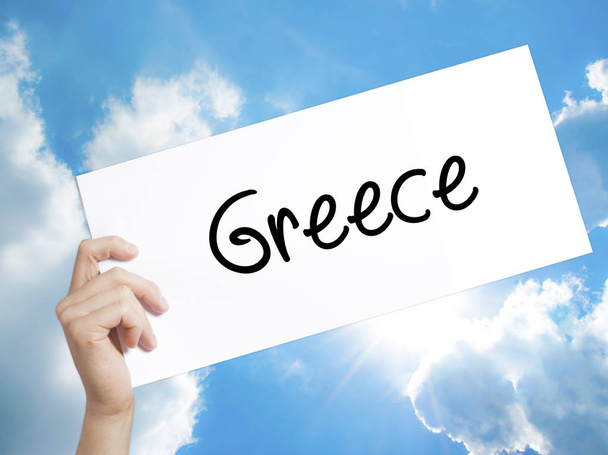 Griekenland teken op wit papier. Man Hand Holding papier met tekst. Ik - Foto, afbeelding