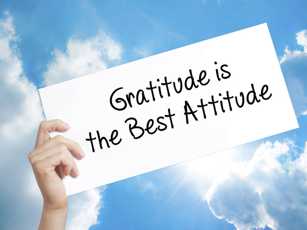 Gratitude is the Best Attitude Sign on white paper. Man Hand Hol - Photo, Image