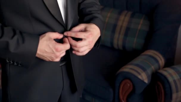 A Man Buttoning His Jacket - Footage, Video