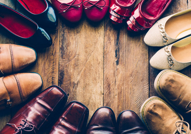 shoes with men and women various styles on a wooden floor - life - Photo, Image