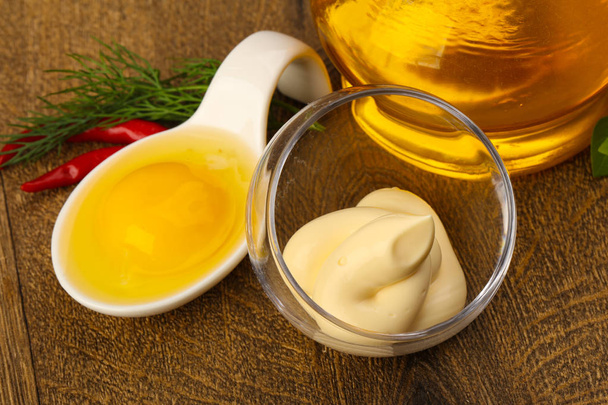 Tasty Homemade Mayonnaise with egg and oil in bottle - Photo, Image