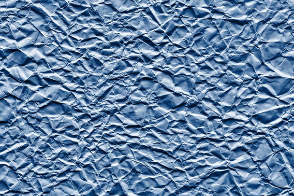 rypistynyt arkki paperi sininen väri
 - Valokuva, kuva