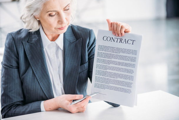 business woman pointing at contract
 - Фото, изображение
