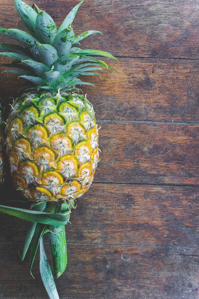 pineapple fruit on wood table  - Photo, Image