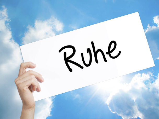 Ruhe (Silencio en alemán) Firma en papel blanco. Hombre mano celebración Pap
 - Foto, imagen