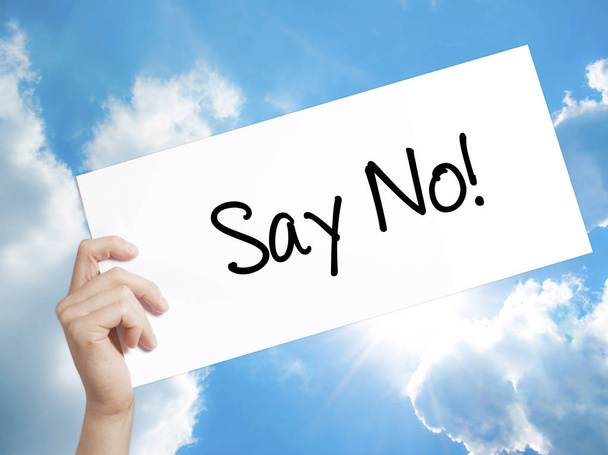 Say No! Sign on white paper. Man Hand Holding Paper with text. I - Photo, Image