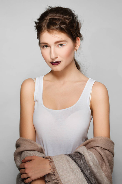 Pretty fashion model with make up and unfinished hairdo. Clean f - Photo, image