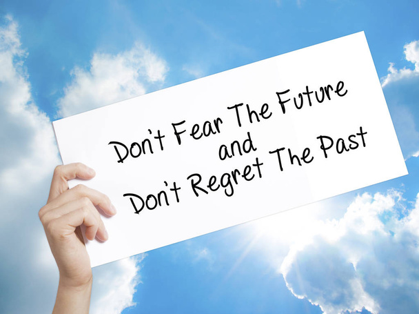 Don't Fear The Future and Don't Regret The Past Sign on white pa - Photo, Image