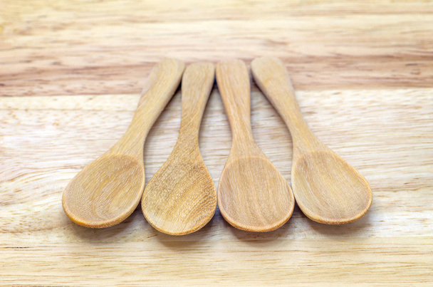 Four empty wooden spoons - Photo, Image