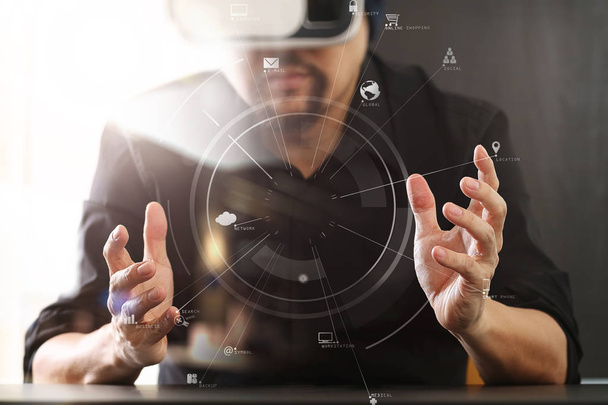 businessman wearing virtual reality goggles in modern office wit - Photo, Image