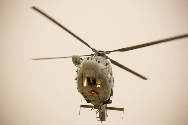 Helicopter flying in the sky closeup - Photo, Image
