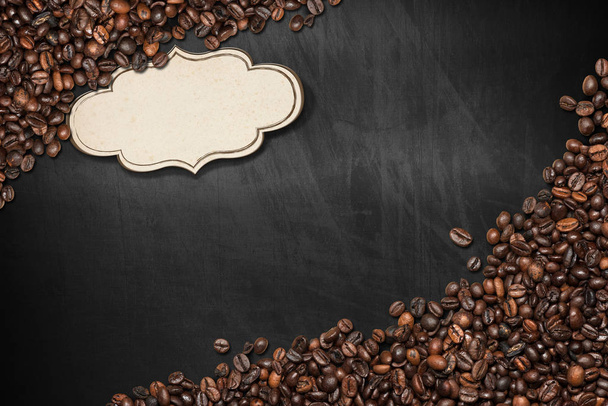 Blackboard with Coffee Beans and a Label - Photo, Image
