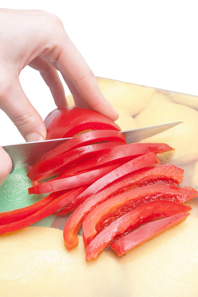 snijden van rode paprika - Foto, afbeelding