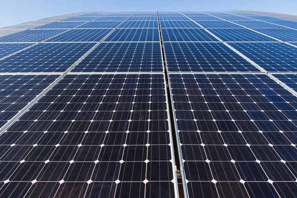Solar panels on the roof of the building - Fotó, kép