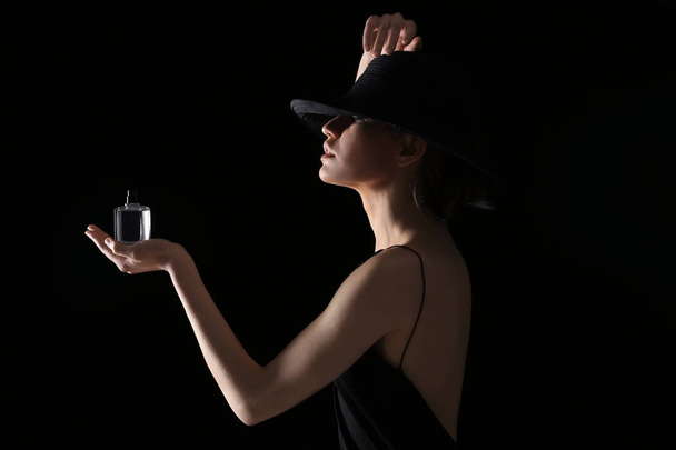 young woman with bottle of perfume - Fotoğraf, Görsel