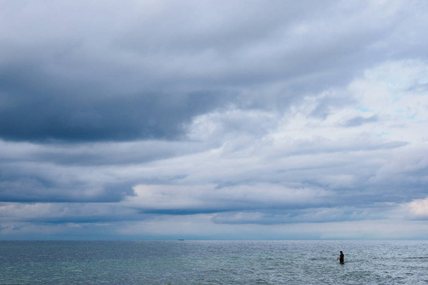 Angler on shore of the Baltic Sea - Photo, Image