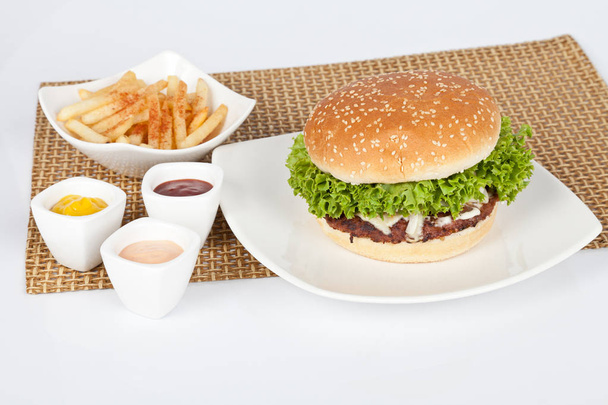 Tasty burger with fries - Foto, Imagen