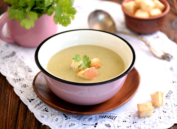 Soup puree from zucchini with cream and crackers. - Photo, Image