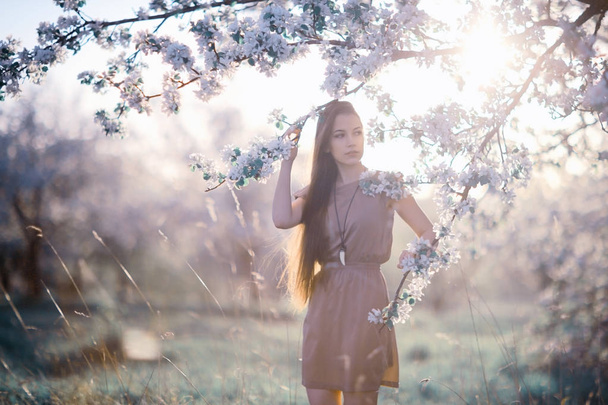 young woman in spring garden  - Foto, Imagem